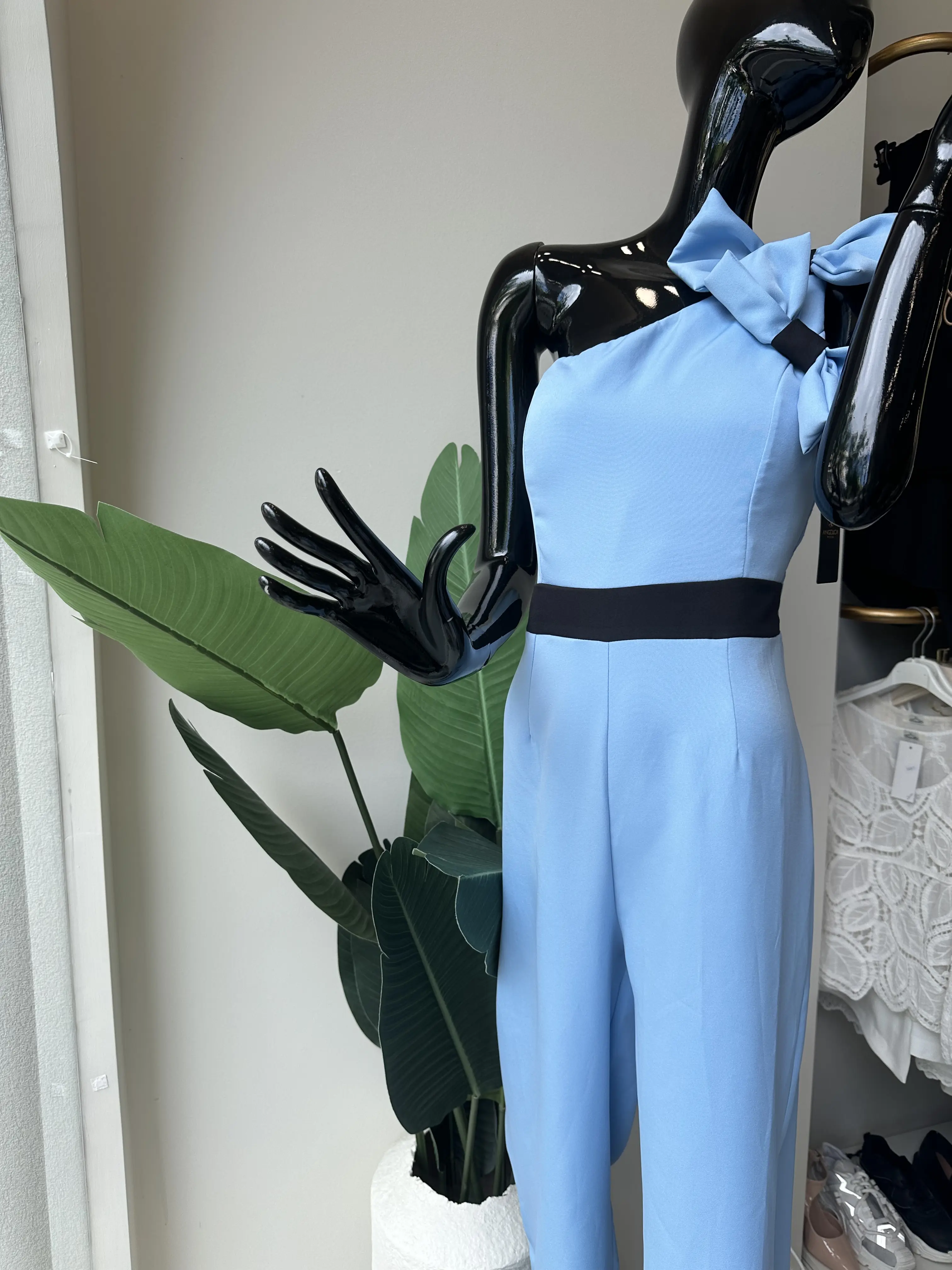 Γαλάζια ολόσωμη φόρμα με λεπτομέρεια φιογκάκια