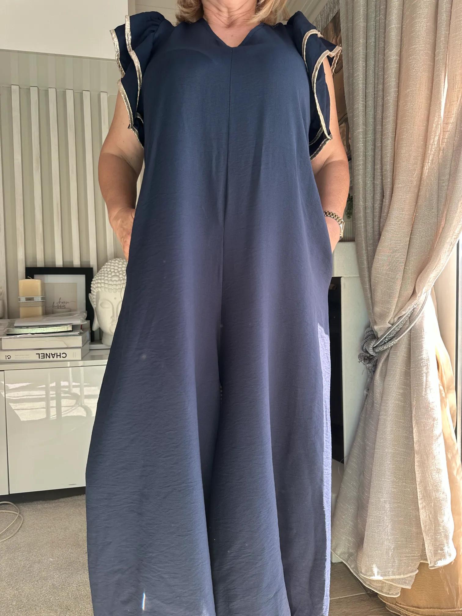 μπλέ σκούρο ολόσωμη φόρμα με βολάν στα μανίκια