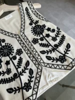 Λευκό κεντητό γιλέκο με μαύρα μοτίβα