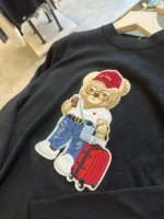 Μαύρη πλεκτή μπλούζα με Teddy Bear απλικέ